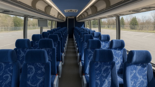 commerce 55 passenger charter bus inside